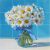 Daisy bouquet ceramic tile mural with polka dot ribbon on blue background